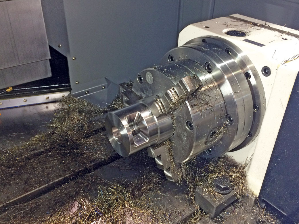 Dreibackenfutter DBFmit Grundplatte auf NC-Rundtisch